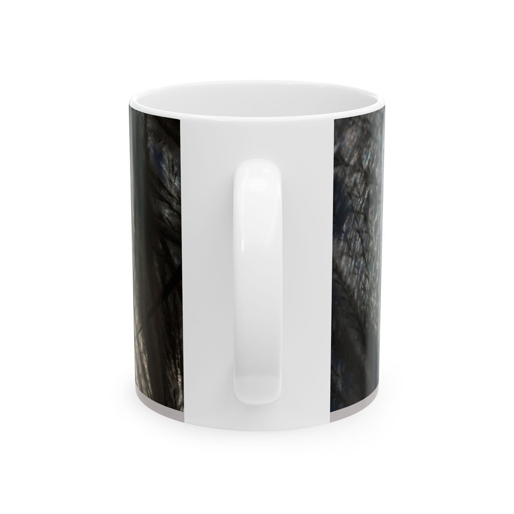 Ceramic mug with feather silhouette and soft neutral botanical design, available in 11oz and 15oz sizes, by Printify.